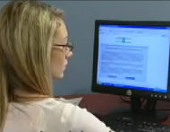 Quick Cash girl at computer